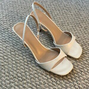 White kitten heels